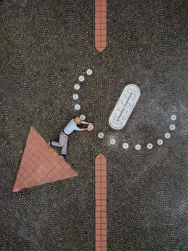 Aerial view of a person playing with surrealism solar system Gavazzana Piemonte Italy.
