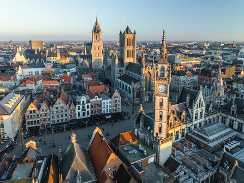 Aerial view of Sint Niklaaskerk (Saint Nicholas' Church) and the Gildenhuis van de Vrije Schippers clock tower in Gent downtown, Ghent, East Flanders, Belgium.