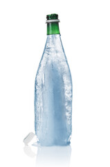 Frozen mineral water in shape of bottle on a white background