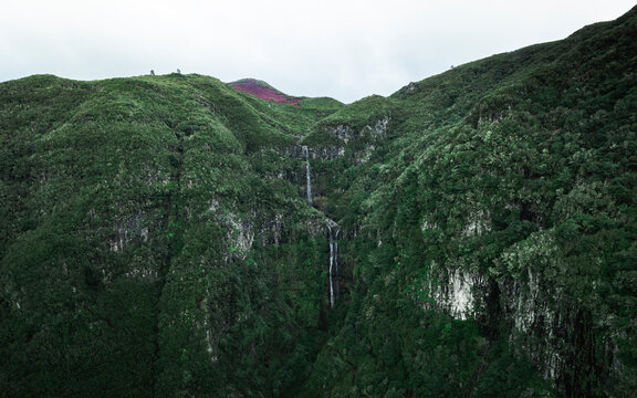 Aerial drone view of Risco Waterfall at the Lagoa das 25 Fontes trail PR6, Madeira island, Portugal.