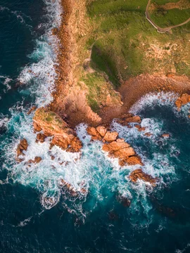 Aerial drone view of a rugged coastline in Philipp Island, Victoria, Australia.