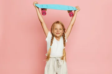 Tuinposter Playful Skateboard Adventures: A Collection of Adorable Kids Enjoying Active Childhood © SHOTPRIME STUDIO