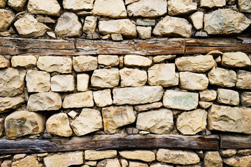 pattern gray color of modern style design decorative uneven cracked real stone wall surface with cement.