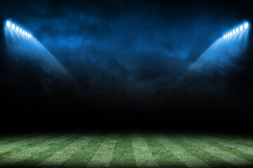spotlight on a soccer filed stadium © arc4studio