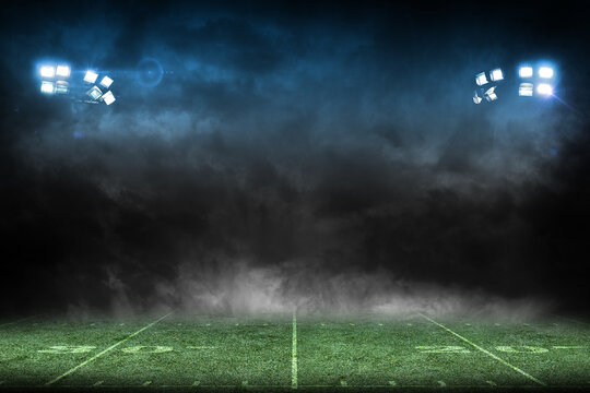 Football stadium lights at night