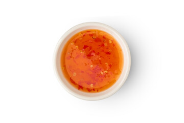 Sweet chili Dipping sauce in white bowl isolated on white background with clipping path.Top view