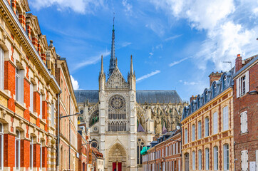 Amiens cityscape of old historical city centre with narrow pedestrian street, typical buildings and...