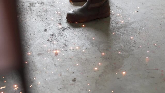 Sparks on floor, welding