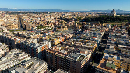 Obraz premium Aerial view of Prati neighborhood in Rome, Italy. In the background there is the dome of St. Peter's Basilica in Vatican City. 