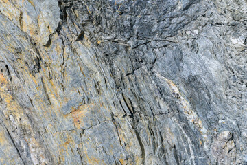 Stone pattern, granite rock surface, colored rock detail texture, tashkaya vein structures, marble granite deposit