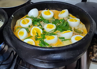 Cod with eggs olives and vegetables