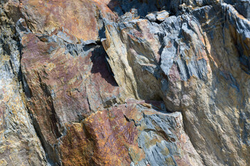 Stone pattern, granite rock surface, colored rock detail texture, tashkaya vein structures, marble granite deposit