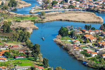 Fotobehang Scenic views from Kaunos and Dalyan, a city of ancient Caria, west of the modern town of Dalyan and The Calbys river ( Dalyan river) which was the border between Caria and Lycia in Muğla, Turkey © Selcuk