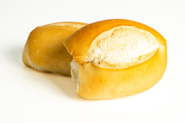 Brazilian Pão Francês, traditional bread also known as 'french bread', isolated on a white background