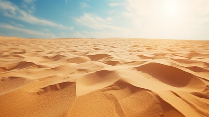A vast expanse of sand dunes under a clear blue sky