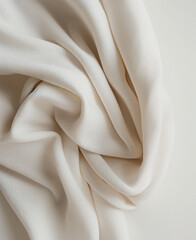 Soft White Fabric Folds on a Plain Background