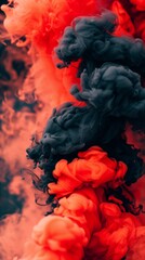 Red and black smoke billowing into the air, creating an ominous and striking visual display