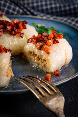 Kartacze - potato dumplings stuffed with minced meat.