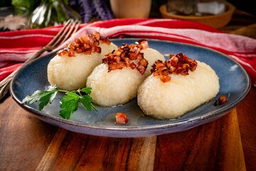 Kartacze - potato dumplings stuffed with minced meat.