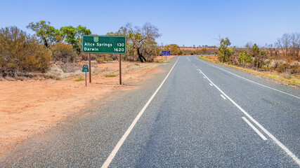 A road sign for Darwin and Alice Springs in Australia's Northern Territory
