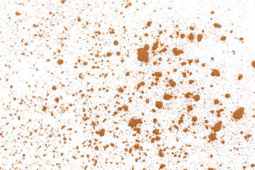 Cinnamon powder scattered isolated on white, texture, macro