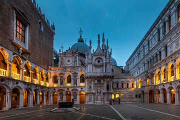 Venice, Italy - February 6, 2024: Courtyard of the Doge's Palace (Palazzo Ducale) in Venice. San Marco basilica in background - obrazy, fototapety, plakaty