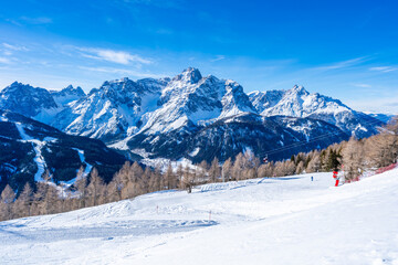 Fototapeta na wymiar Winter landscape with snow covered Dolomites in Kronplatz, Italy