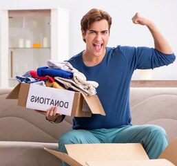 Concept of charity with donated clothing