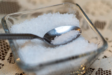 Cup of salt with an spoon