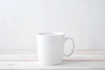 Fototapeta na wymiar A blank white coffee mug on a soft wooden surface with space for text. White Coffee Mug on Wooden Background