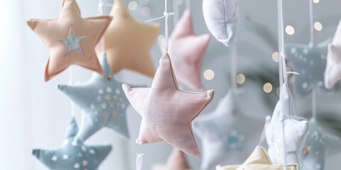 Stars Pillows. Pastel star-shaped Nursery Mobile. Background for a baby products store, pink blue.