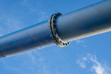 blue pipeline with blue sky in the background