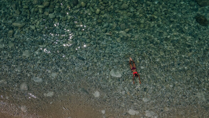 girl swims in the Mediterranean Sea. turkey beach