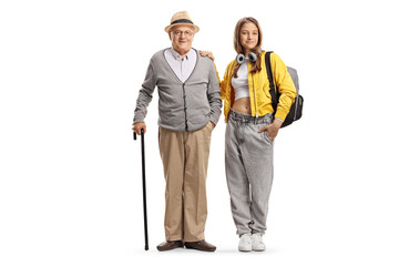 Teenage girl posing next to her grandfather