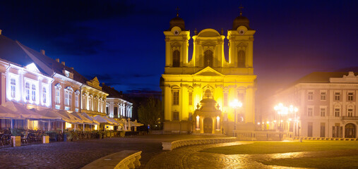 Fototapeta premium Night view of St.George Roman Catholic Dome on Unirii Square, Timisoara, Romania
