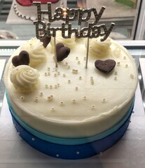 Sparkling Blue Cake with White Chocolate with Happy Birthday ornaments