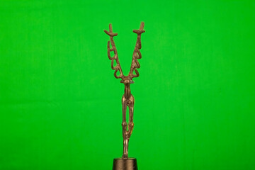 anatolian deer statue made from bronze shot  in front of a green screen