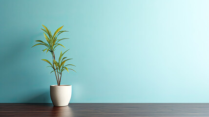Illuminated minimal scene: dark wooden table, pastel blue wall, white vase, green foliage.