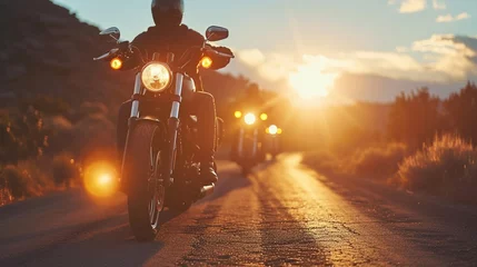 Tuinposter group of motorcycle riders riding together at sunset © Shami
