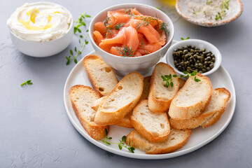 Making salmon crostini or bruschetta with smoked salmon