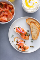 Making salmon crostini or bruschetta with smoked salmon