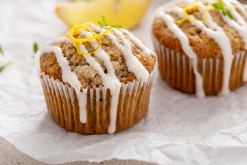 Lemon zucchini muffins drizzled with sugar glaze