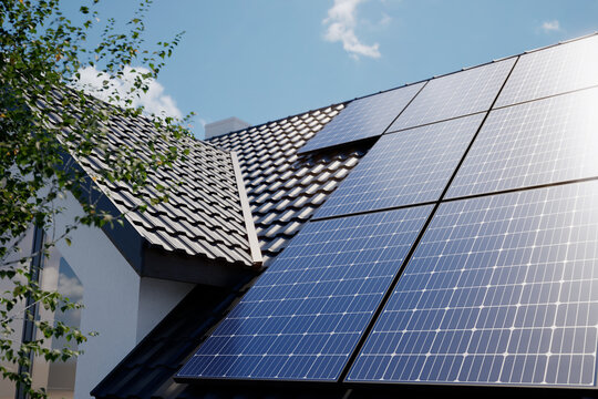 Solar panels on roof house, 3D illustration	
