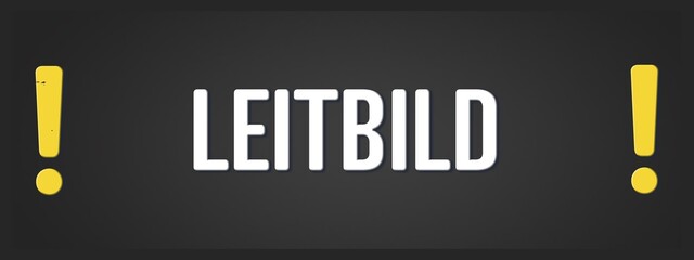 Leitbild. Eine schwarze Tafel mit weissem Text. Illustration mit Grunge Textstil.