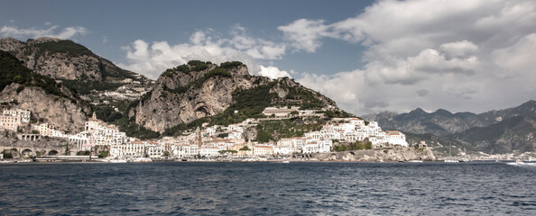 Amalfi, Italy, September 26, 2023: View from the sea of beautifully situated buildings on the...