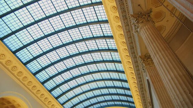 beautiful glass ceiling of old style with sky through. old union train station building in Chicago