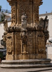 Some architectural details of the beautiful Spire of the Immaculate Conception Baroque monument of Nardò in Puglia, which represents a symbol of devotion and a point of reference for the city