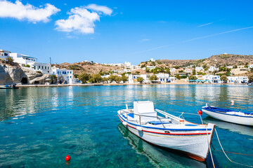 Fototapeta na wymiar Traditional style fishing boat in Kimolos island port, Cyclades, Greece