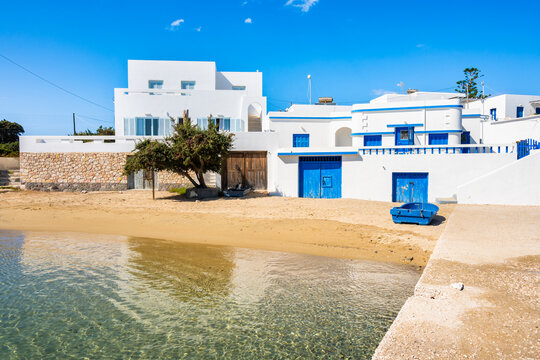 Beautiful sandy beach in Pollonia port, Milos island, Cyclades, Greece