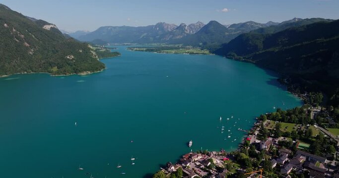 Aerial Arcing View Of A Town By Wolfgang Lake